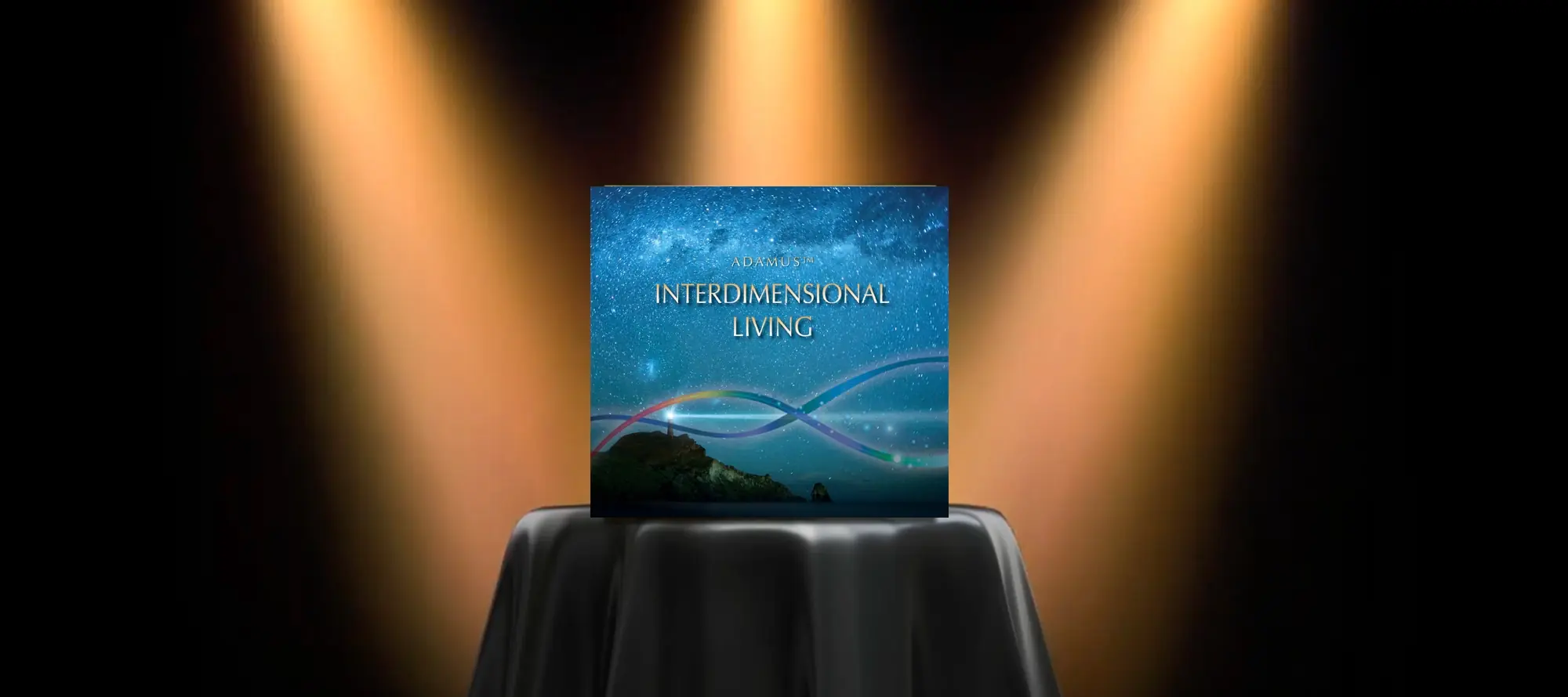 spotlight graphic: bar table with black cloth highlighted by three spotlights, with "interdimensional living" product cover presented on top of table