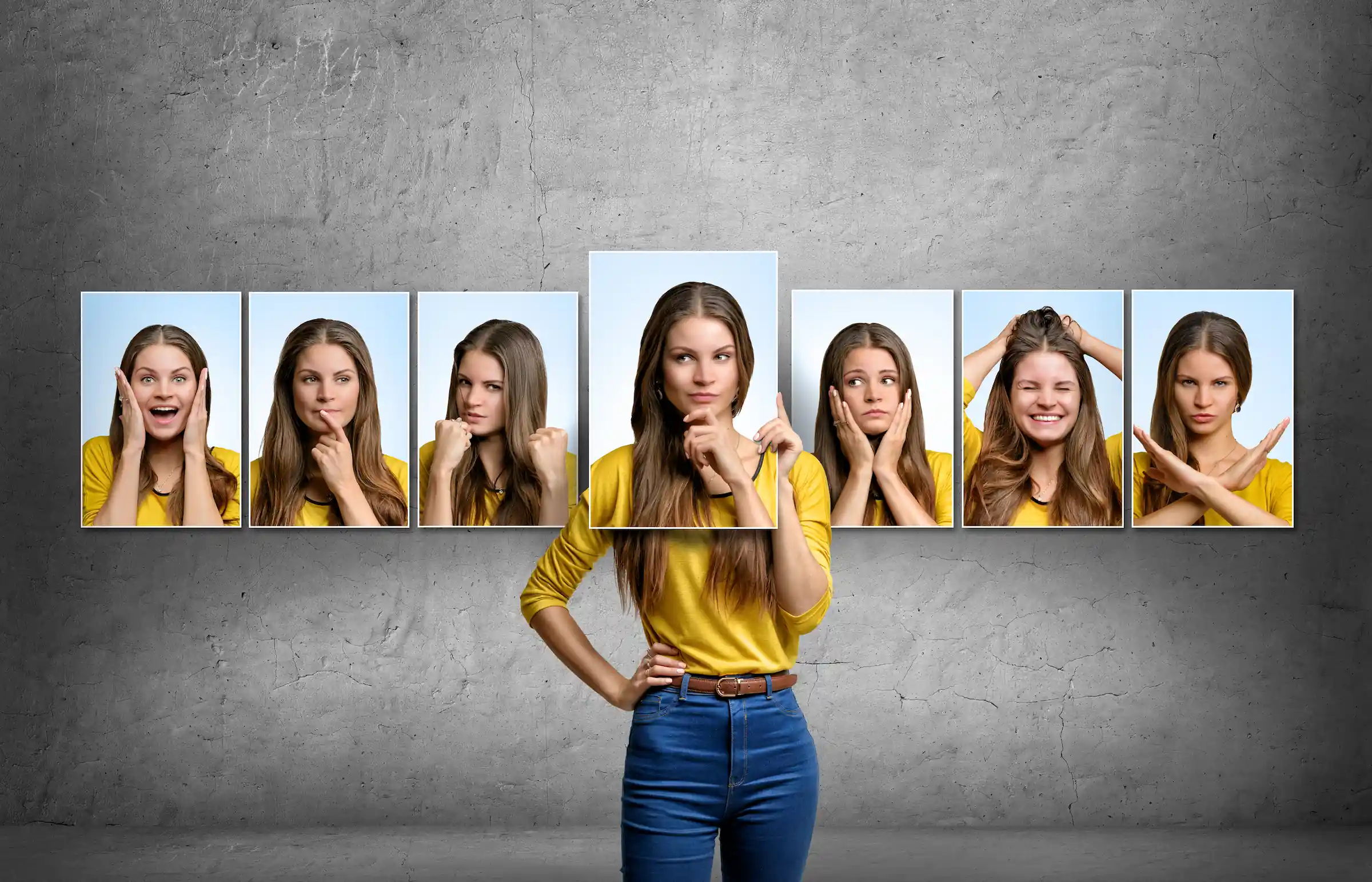 a portrait photo collage of a woman, 7 different facial expressions depicted in small photos, lined up in a row, with the woman standing in the middle and holding up one of the photos