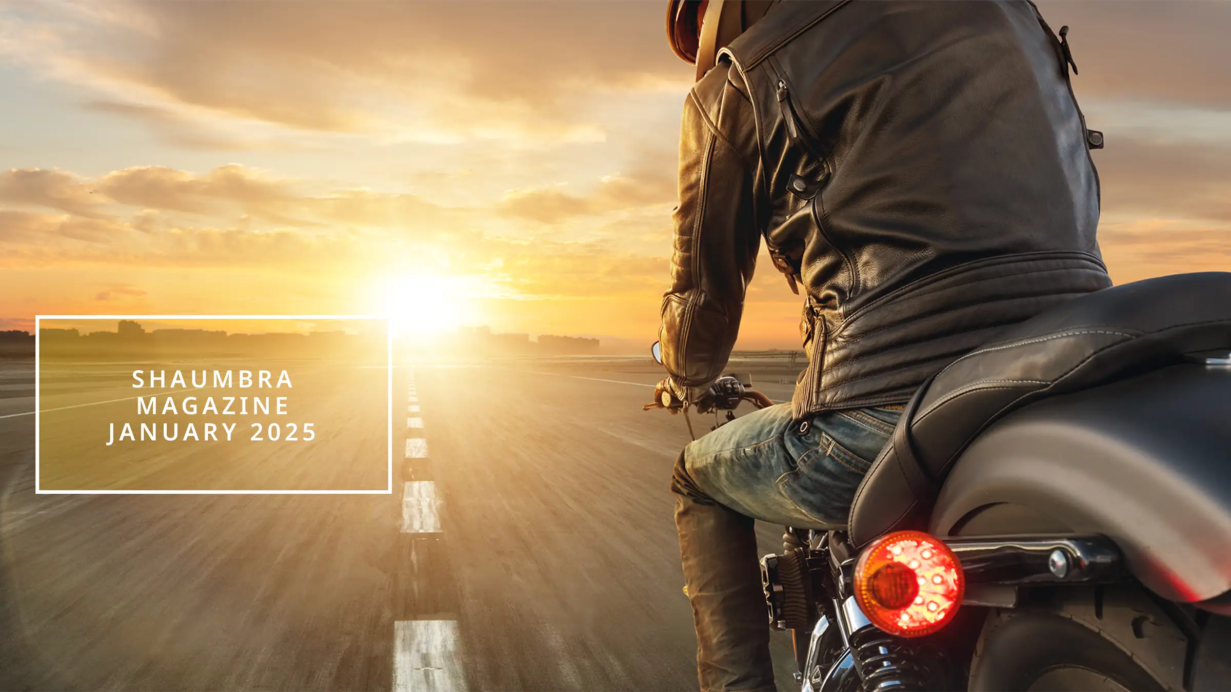 cover of the january 2025 issue of the shaumbra magazine, showing a person riding a motorcycle on a wide open track towards the sun