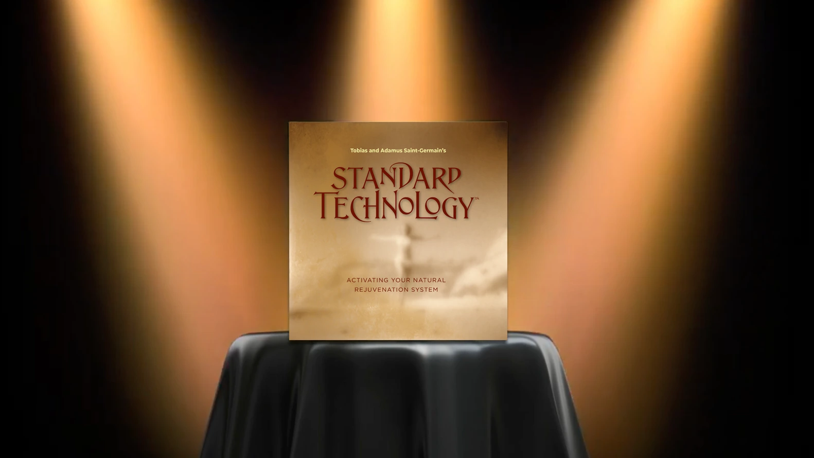 spotlight graphic: bar table with black cloth highlighted by three spotlights, with "standard technology" product cover presented on top of table